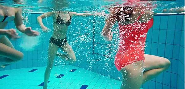  3 nude girls have fun in the water